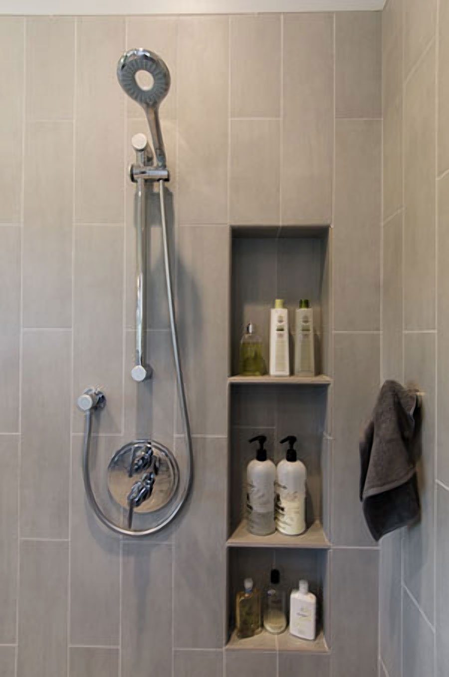 https://www.harrelldesignbuild.com/wp-content/uploads/2013/09/bathroom-shower-shelves-LARGER.jpg